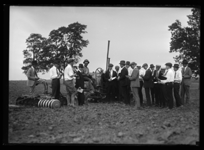 Farm Mfg. class taking notes on tractor--Jochum's Farm 6/3/1919