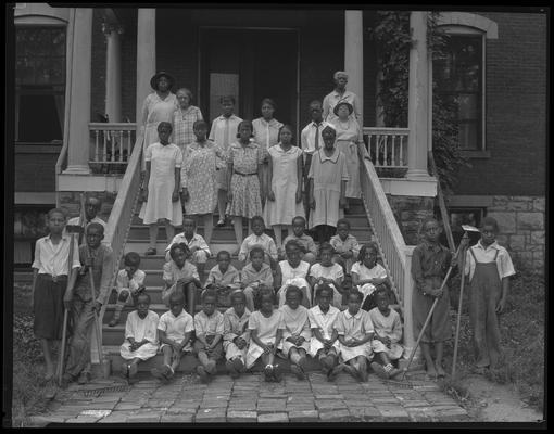 Colored Orphans' & Industrial Home, 644 Georgetown; exterior, group on porch (African-American)