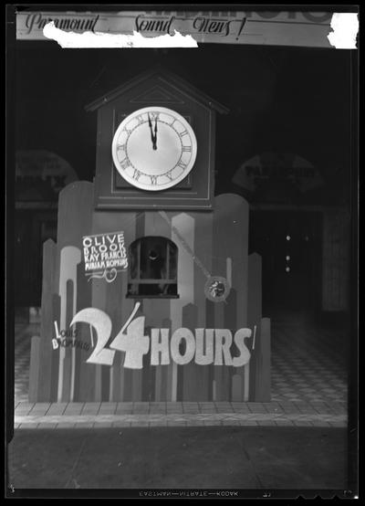 Kentucky Theatre (movie theater), 214 East Main, exterior; ticket booth decorated to promote 