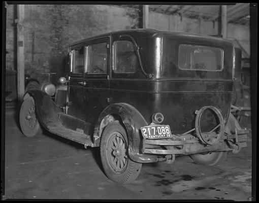 Toombs, Louis; wrecked car