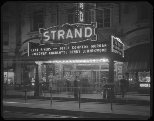 Strand Theatre (movie theater), 153 East Main, exterior, street scene; nighttime marquee for 