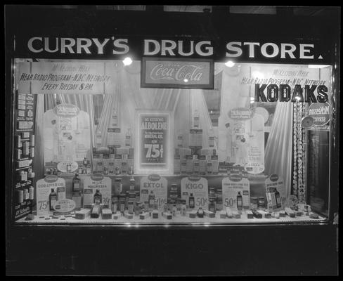 Curry's Drug Store, 101 West Main; exterior window