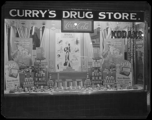 Curry's Drug Store, 101 West Main; exterior window