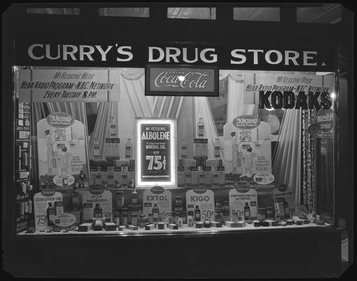 Curry's Drug Store, 101 West Main; exterior window