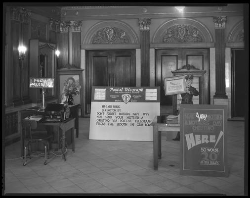 Kentucky Theatre (movie theater), 214 East Main, interior; lobby standees and displays for Postal Telegraph