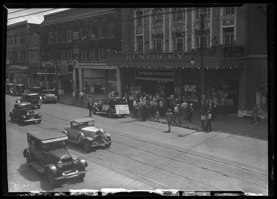 Kentucky Theatre (movie theater), 214 East Main, exterior, street scene; awning and promotional car decorated for 