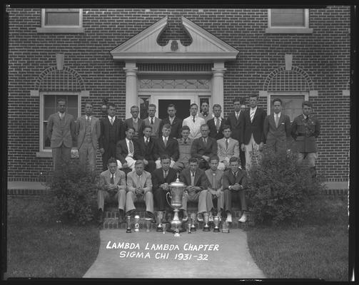 Sigma Chi Fraternity, Lambda chapter; group in steps (trophies, cups)