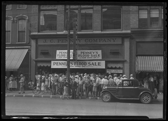 JC Penney Company, 314-316 West Main; exterior crowd, Flood Sale