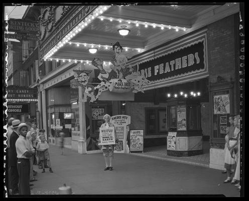 Kentucky Theatre (movie theater), 214 East Main, exterior; lobby entrance and ticket booth decorated to promote the Marx Brothers film 