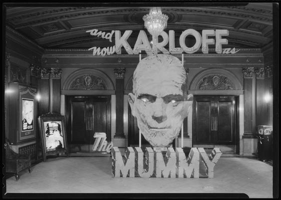 Kentucky Theatre (movie theater), 214 East Main, interior, lobby; standee to promote 
