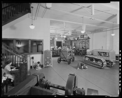 Wilson Machinery & Supply Company, 139-141 North Mill; interior (lawnmower, tractors, handcarts, bulldozers)