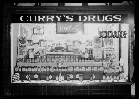Curry's Drugs; exterior window