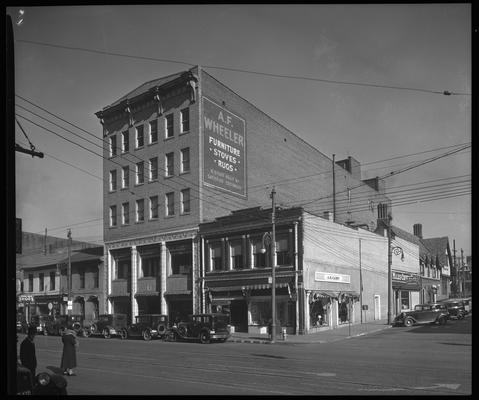 A.F. Wheeler Furniture Building, 221-223 East Main; exterior (George Collis Shoes, Miles Coffee House, A.M. Caden, Italian Restaurant)