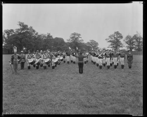 Man O' War Drum and Bugle Corps; group with conductor