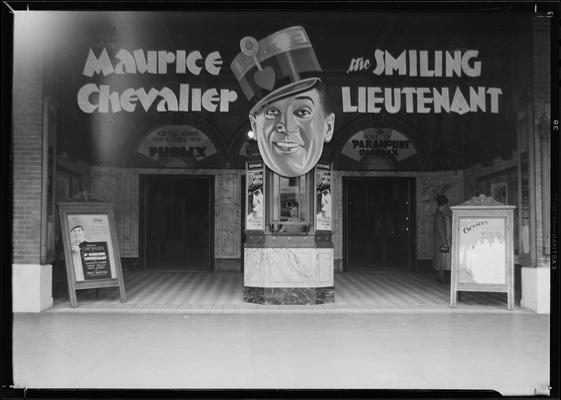 Kentucky Theatre (movie theater), 214 East Main, exterior; lobby entrance and occupied ticket booth decorated to promote 