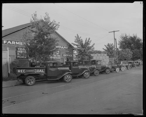 Farmers Supply Company, 325 East Vine; exterior, trucks (Mr. Kitrell; Reo Motor Company)