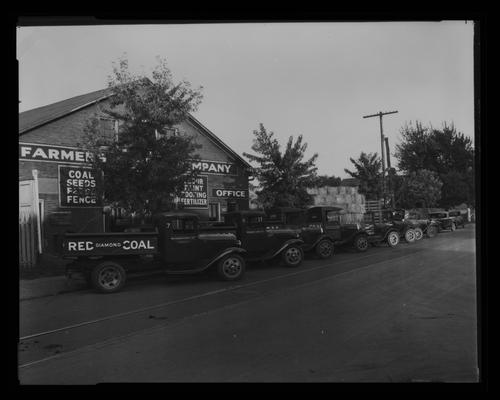 Farmers Supply Company, 325 East Vine; exterior, trucks (Mr. Kitrell; Reo Motor Company)