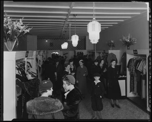 Budget Dress Shop, 206 West Main; interior, shoppers at sale