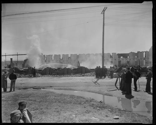 James E. Pepper Company (bourbon whiskey distillery); fire scenes, firemen, crowd