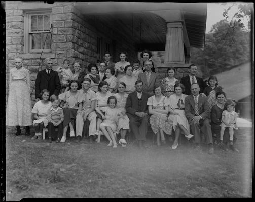 L.B. Staley; group on porch