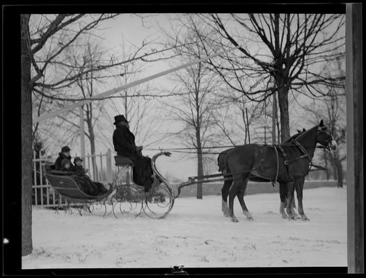 J. E. Madden; Mrs. Madden and Children in sleigh
