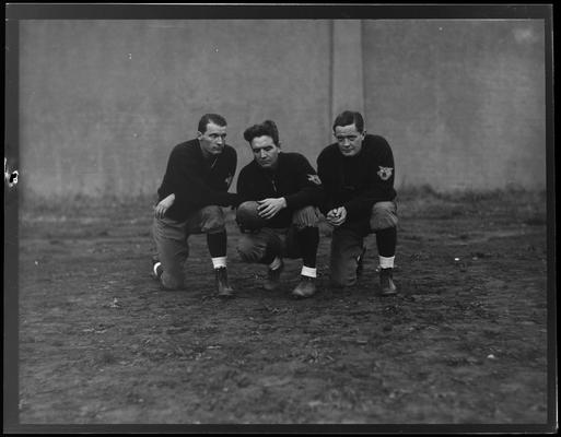 3 unidentified football players (Kentuckian, 1937) (University of Kentucky yearbook)