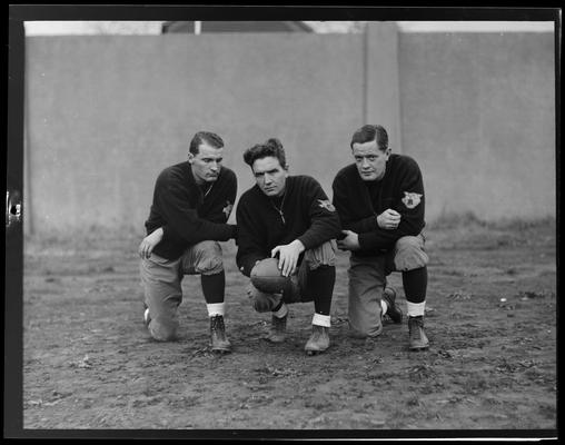 3 unidentified football players (Kentuckian, 1937) (University of Kentucky yearbook)