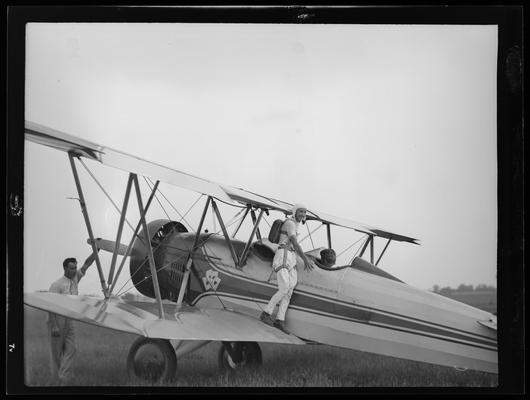 Flying Circus; Airport; Lady with Parachute on plane; identified in 
