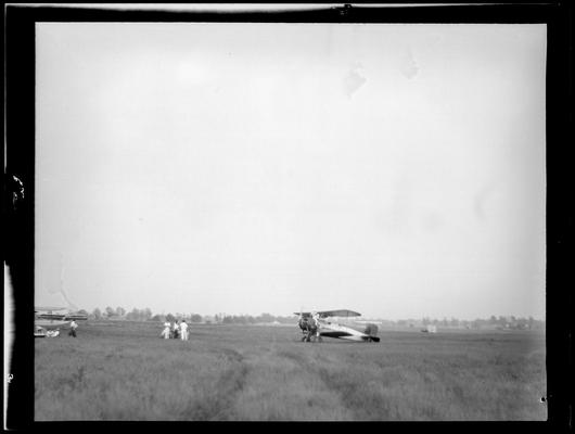 Flying Circus; Airport; airplane on ground with people; Cool Meadow