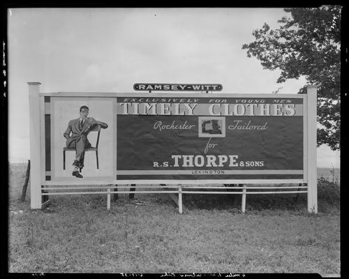 R.S. Thorpe & Sons (123, 125, 127 East Main); billboard (Rochester-tailored clothes for young men)