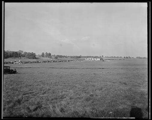 Cool Meadows; Lexington Airport; people gathered in field