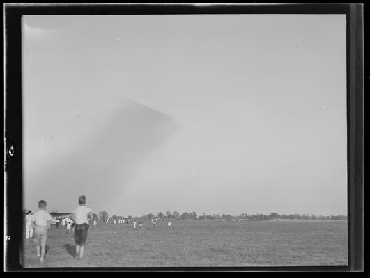 Cool Meadows; Lexington Airport; people in field