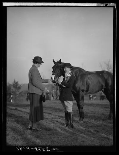 Horse Show, J.E. Madden; two people standing next to horse