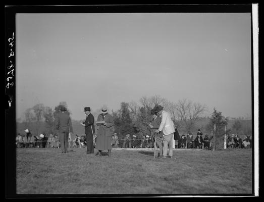 Horse Show, J.E. Madden; people walking on track