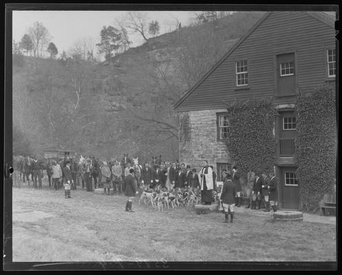Blessing of the Hounds (Iroquois Hunt Club); group of people gathered around pack of dogs