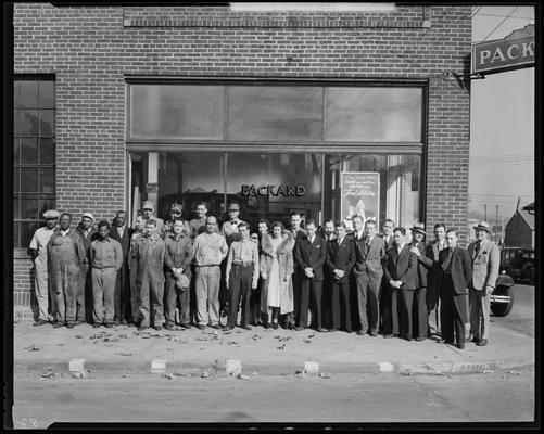 Packard Motor Cars (Vine at Southeastern Avenue) garage; group of people gathered outside of building, East Vine Street
