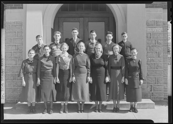 Midway High School; Sr. (Senior) High, group of unknown people standing outside of building, possibly Margaret Ware Parrish is in the front row, first right
