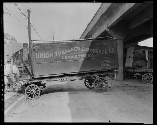 Lexington Transfer and Storage, 230-232 West Vine; horse drawn wagon backed up to warehouse loading supplies