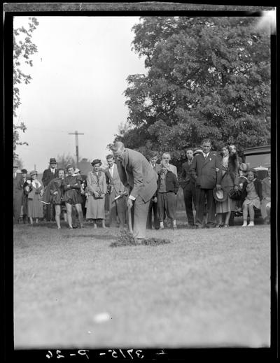 Transylvania (College) Day; groundbreaking ceremony, man digging a hole with shovel