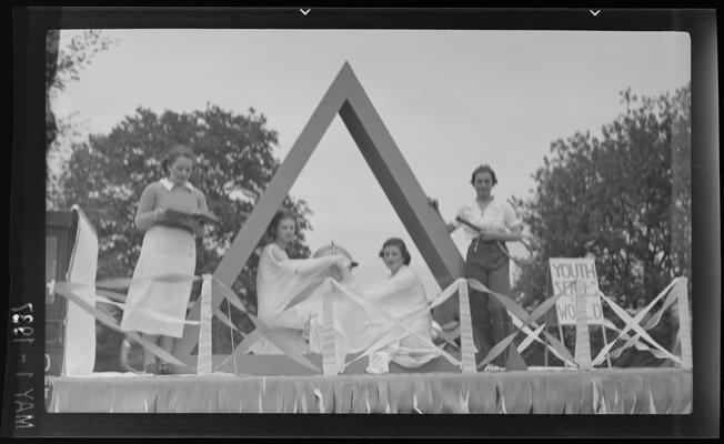 Transylvania (College) Day; four girls on a triangle shaped float