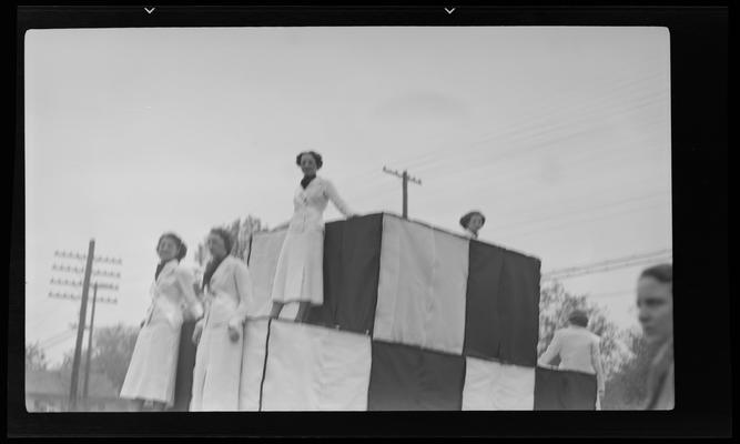 Transylvania (College) Day; women standing on float in parade