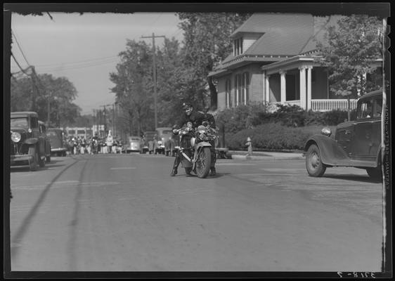 University of Kentucky May Day; police motorcycles riding in parade