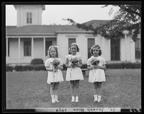St. Joseph's Hospital, 544 West Second (2nd) Street; three young girls holding flowers