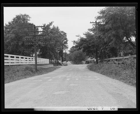 John Crosby; road view approaching 4-way intersection; country road