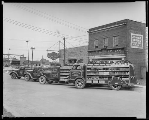 John G. Epping Bottling Works, 264 Walton Avenue; trucks parked outside of building; Epping's True Fruit Drinks; Kentucky Club ginger ale
