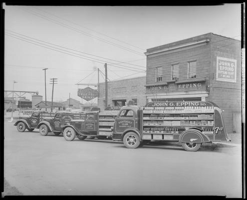 John G. Epping Bottling Works, 264 Walton Avenue; trucks parked outside of building; Epping's True Fruit Drinks; Kentucky Club ginger ale