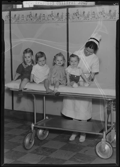 Kentucky Crippled Children's Commission; Good Samaritan Hospital, 310-330 South Limestone; nurse examining children