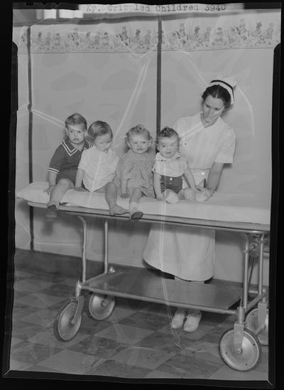 Kentucky Crippled Children's Commission; Good Samaritan Hospital, 310-330 South Limestone; nurse examining children