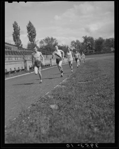 University of Kentucky Track Team (1939 Kentuckian), team members running
