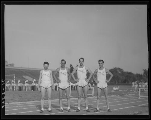 University of Kentucky Track Team (1939 Kentuckian), four team members posing on track
